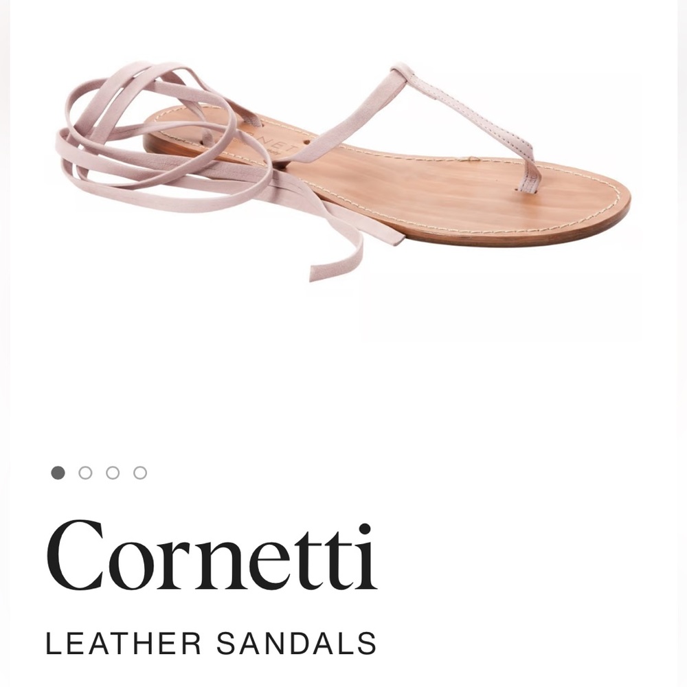 CoRNETTI Sandlas with ties to wrap around ankles.